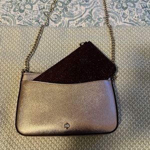 Kate Spade shimmery crossbody. Pale pink with wallets in a burgundy shimmer